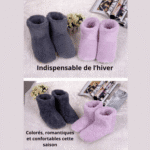 Chaussons chauffants USB rose et gris posés sur une table, accessoires d’hiver confort