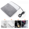 Chauffe-pieds à température constante ThermaFeet™ interface USB universelle.