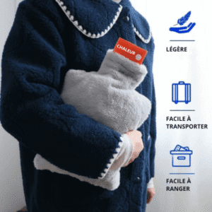 Bouillote chauffante usb tenue portable tenue dans les mains d’un homme