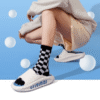 Chaussons femmes KushySlip avec soutien de la voûte plantaire et semelle massante.