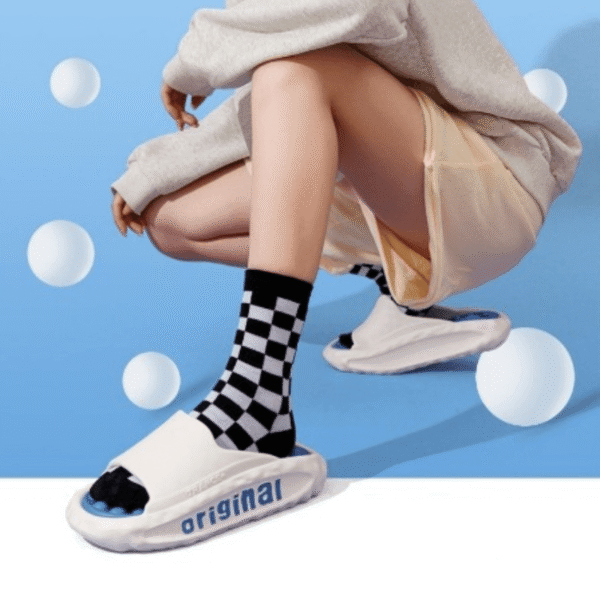 Chaussons femmes KushySlip avec soutien de la voûte plantaire et semelle massante.